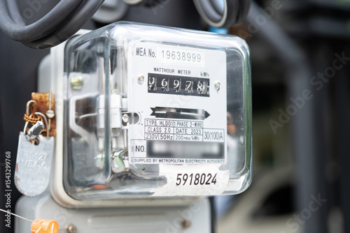 Electric measuring power meter for energy cost at home and office.