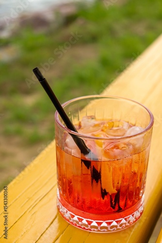 Alcoholic summer cocktail with ice