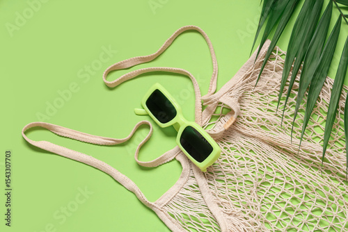 Stylish sunglasses and stri...