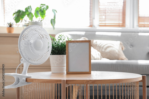 Electric fan with plant and...