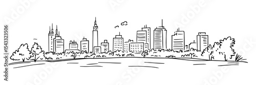 modern city skyline with trees and grass foreground