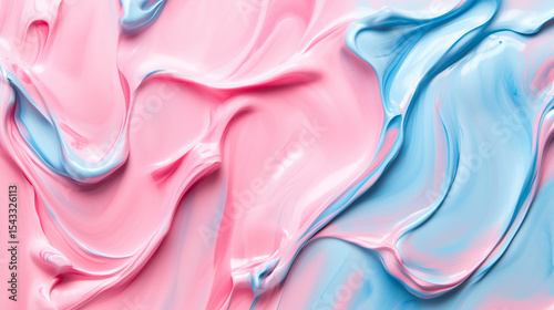 With copy space and a fluid composition, the blend of abstract pastel pink color paint and pastel blue background evokes a sense of minimal natural luxury.

