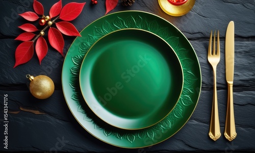 Festive green dinnerware with gold cutlery and red accents for elegant holiday table decor