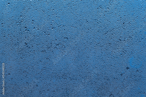 Texture of water drops on glass