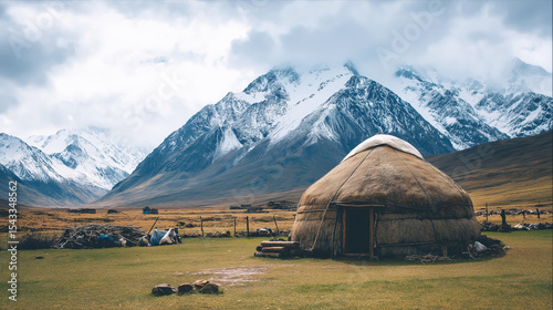 nomadic yurt on field in highlands on the background of mountains in Asia in Kazakhstan