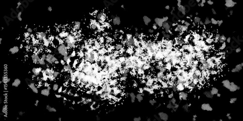 Snowflakes on dark background. white icy snowflakes isolated on black background, natural background. white crystalline powder on a black background. sugar dust. texture, pattern and clipping.