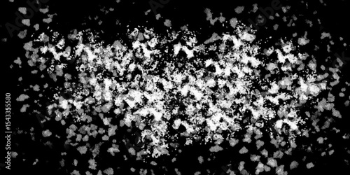 Snowflakes on dark background. white icy snowflakes isolated on black background, natural background. white crystalline powder on a black background. sugar dust. texture, pattern and clipping.
