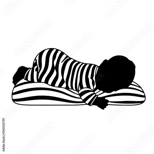 Silhouette of newborn in striped sleeper on pillow, peaceful sleep simplicity