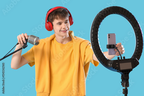 Teenage boy recording podca...