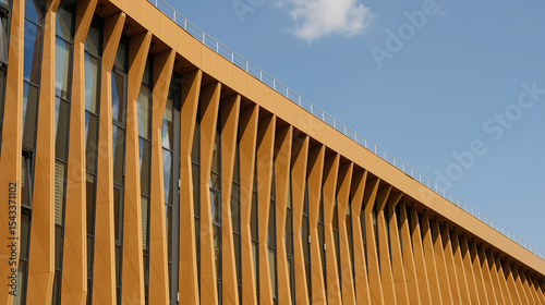 Terracotta fins create striking facade on modern building. Contemporary urban architecture and sustainable building practices. Real estate, residential apartments and office building architecture.