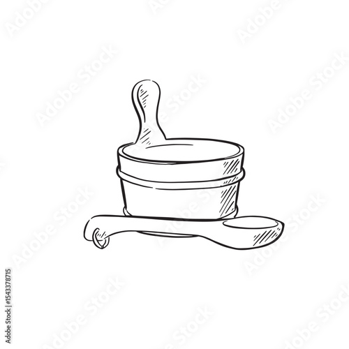 A bucket and scoop from a sauna spa.