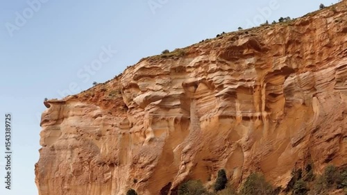 Wallpaper Mural Sandstone Erosion Timelapse. Spectacular Red Rock Cliffs with Vertical Strata in a Desert Landscape Torontodigital.ca