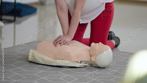 Learning essential CPR techniques on a training mannequin in a safe environment
