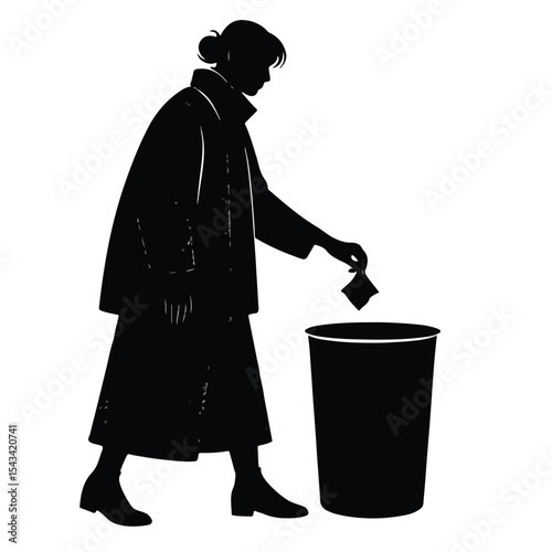 silhouette of a person throwing rubbish in a trash can