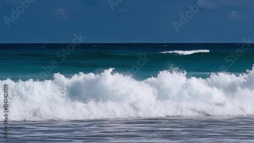 Majestic Ocean Waves Crashing Shore Dramatic Turquoise Water White Foam Powerful Surf Breaking Intense Energy Nature Scene Tropical Paradise Beach Background Cinematic 4 K High