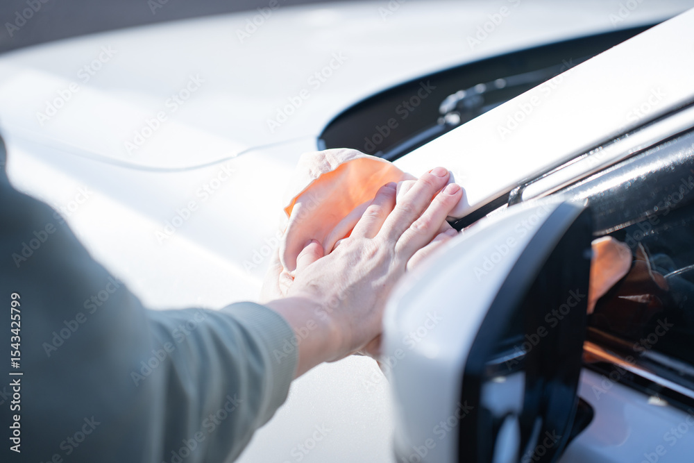 washing a dirty car and wheels with water and a pressure washer washing a dirty car and wheels with water and a pressure washer