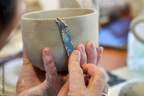 Shape clay with hands