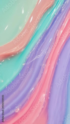 Colorful abstract waves of paint in pastel shades of blue, pink, green  
