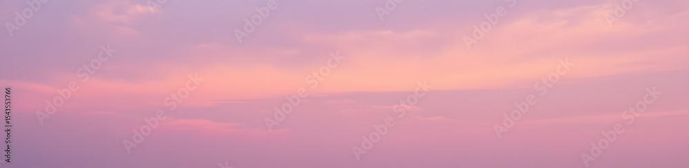 Fototapeta premium Serene pastel sunset hues paint the evening sky, delicate clouds drift lazily across a breathtaking canvas of pink and orange shades. A calming scene.