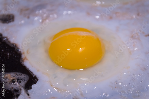 Eggs cooking in the frying pan for a good breakfast
