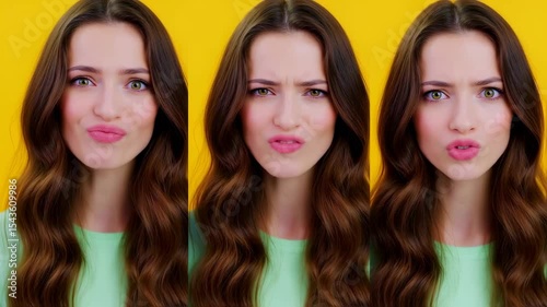 A beautiful young adult with green eyes and pink lipstick changes her expression from a flirty pucker to playful annoyance.