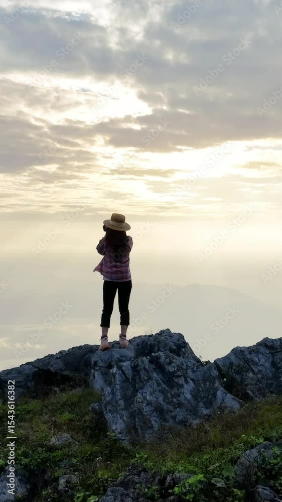 Tourist enjoy nature panoramic landscape at Doi pha mon mountains in Chiang rai, Thailand.