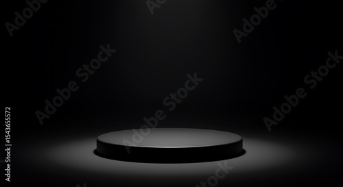 Elegant black podium illuminated with spotlight for product presentation and displays against black