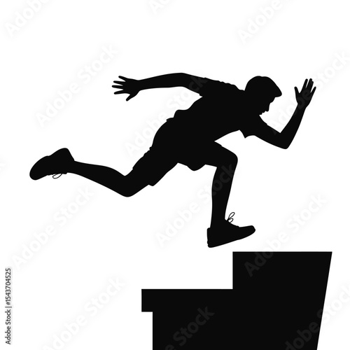 Silhouette of a man jumping stairs