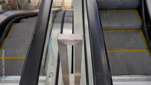 Escalator stairs close-up, moving steps up and down