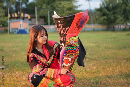 Loei Thailand July 6 2024 Phi Ta Khon festival Ghost mask and colorful costume Fun Traditional Tradition Very famous There are tourists around the world at Dan Sai Loei halloween of Thailand