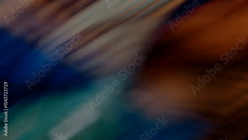 Abstract dark textured background with multi-colored blurred streaks, ideal for artistic and expressive digital concepts