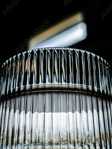 Vertical photo of a clear glass filled with water