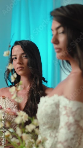 Candid shot of two beautifull female brides during their wedding ceremony indoor