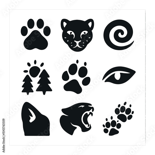 Jungle Predator Icons. Solid, filled icons set of jungle predator animals: tiger paw, jaguar face, leopard