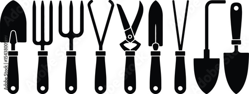 A collection of black and white gardening tools arranged in a horizontal row