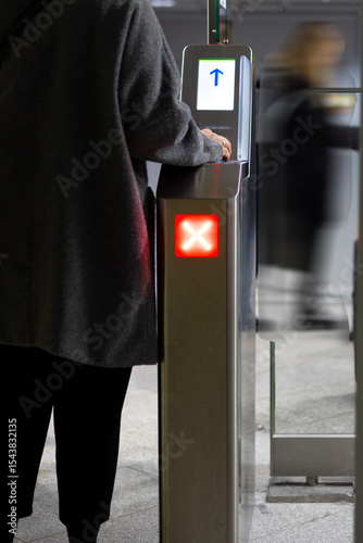 Frankfurt Airport, Germany - February 19, 2024: a passenger checks in at a self service entrance control