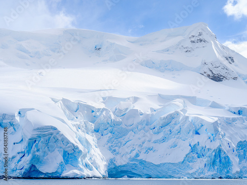 The coast of Brabant Island at Chiriguano Bay in the Palmer Archipelago during spring. Antarctica, Antarctic Peninsula, Palmer Archipelago