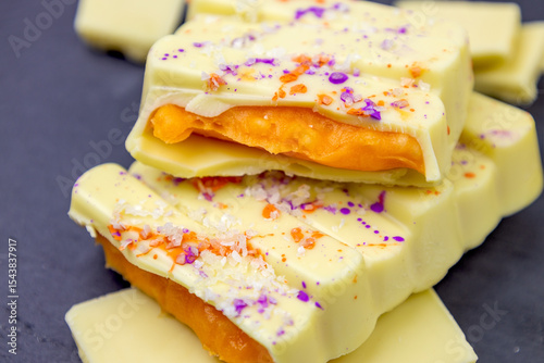Canvas Print White Mango Dubai Chocolate bar with orange mango, passion fruit spread filling