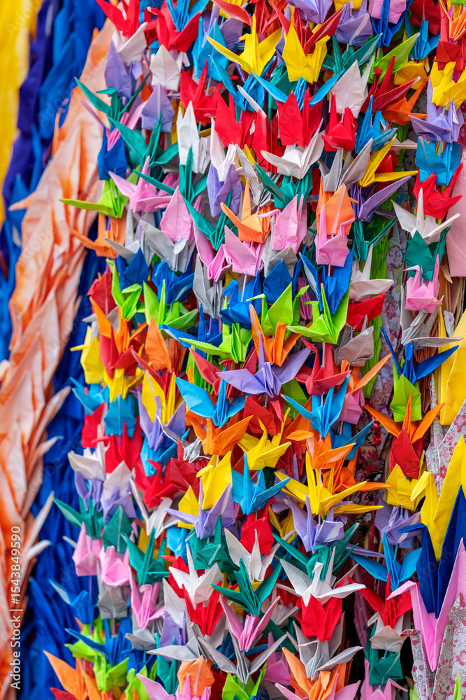 Fototapeta premium 1000 cranes origami created as a prayer for peace on display in Peace Memorial Park, Hiroshima, Japan