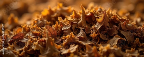 Close-up of dried shredded tobacco leaves, brown and textured , heap, dried, pipe tobacco
