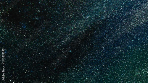 Diagonal blue-green glitter pattern