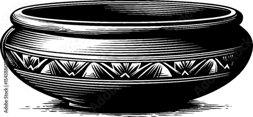 Ancient clay pot with geometric carvings and intricate design