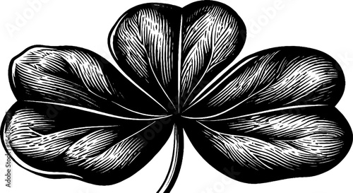 Four leaf clover with halo on black background for good luck and st. patrick's day design