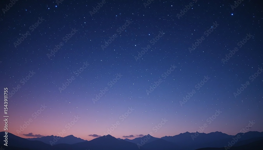 Fototapeta premium Starry night sky over a majestic silhouette of mountains