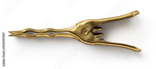 A vintage-style brass nutcracker designed for cracking nuts with ease.