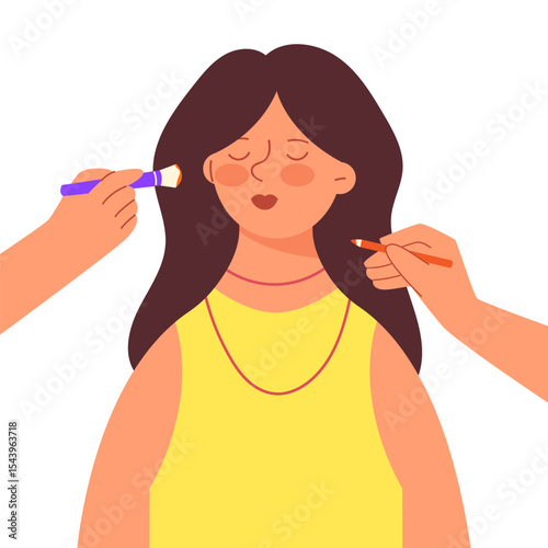 A young girl, a woman is getting her make-up done. Beauty, grooming