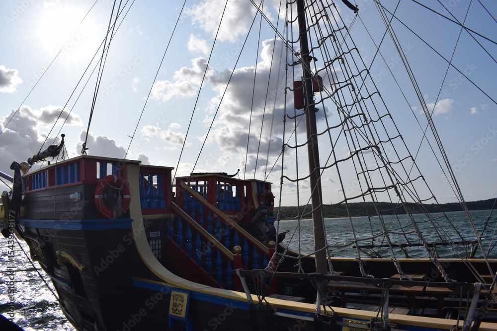 Fototapeta premium boat sailing in the harbour of the baltic sea in the morning