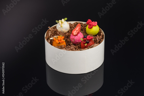 fruit berry tea in transparent balls and heart.