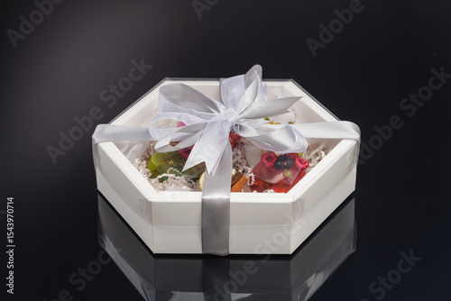 fruit berry tea in transparent balls and heart.