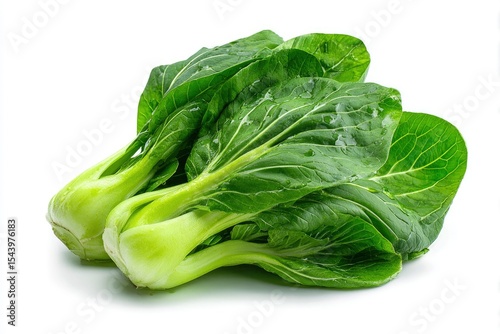 Two bunches of bok choy featuring vibrant green leaves and light green bulbs arranged on a white background